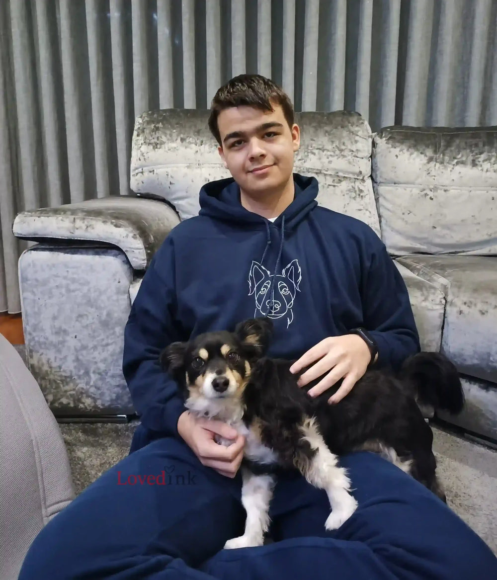 Man with Border Collie wearing navy custom embroidered hoodie with minimalist dog portrait (Lovedink)