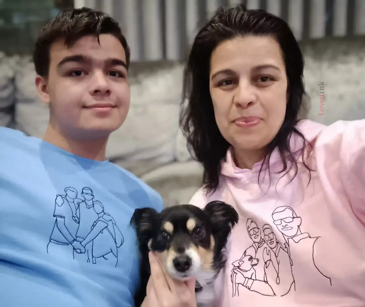 Mother and son wearing pink custom embroidered hoodie with minimalist dog portrait line art (Lovedink)