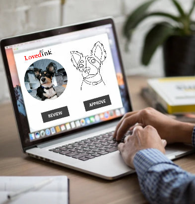 Person using a laptop to review the drawing. Lovedink