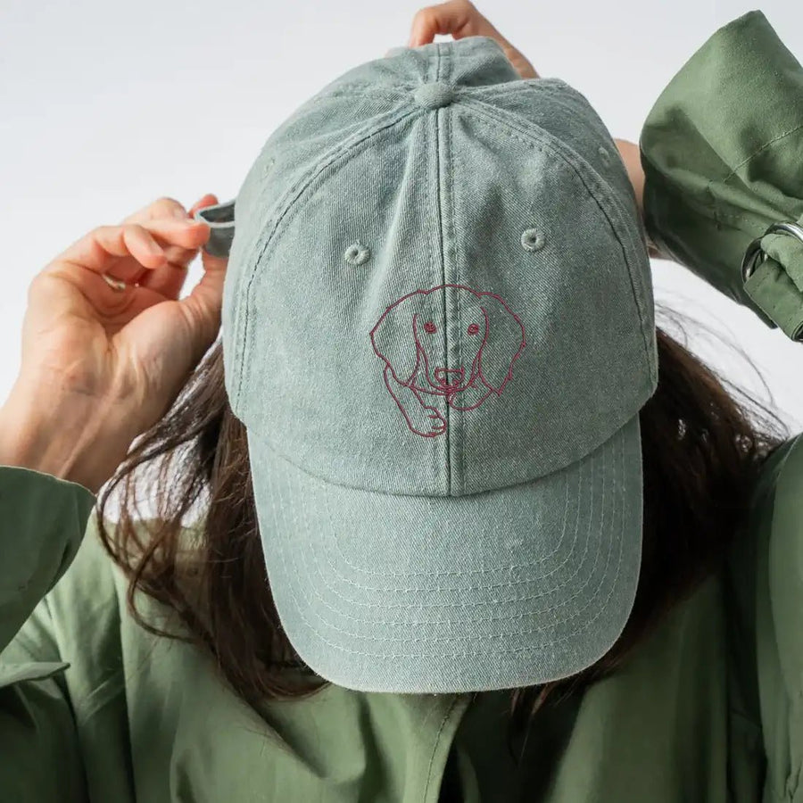 Sage green custom embroidered baseball cap with minimalist pet line art (Lovedink)
