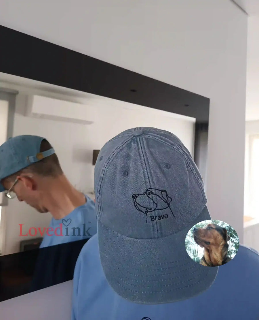 Person wearing light blue custom embroidered baseball cap with minimalist design (Lovedink)
