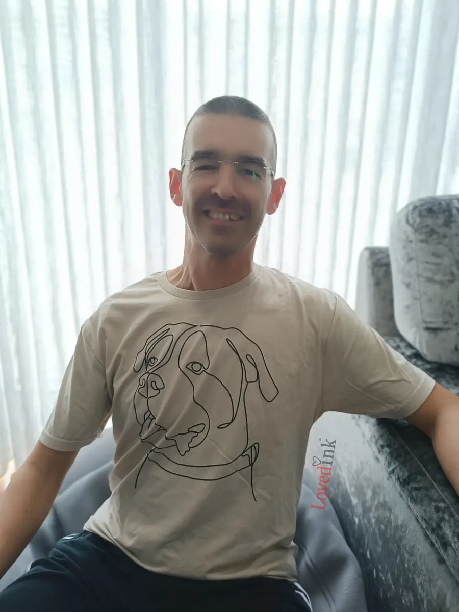 Man wearing beige custom t-shirt with minimalist portrait line art — personalized gift (Lovedink)